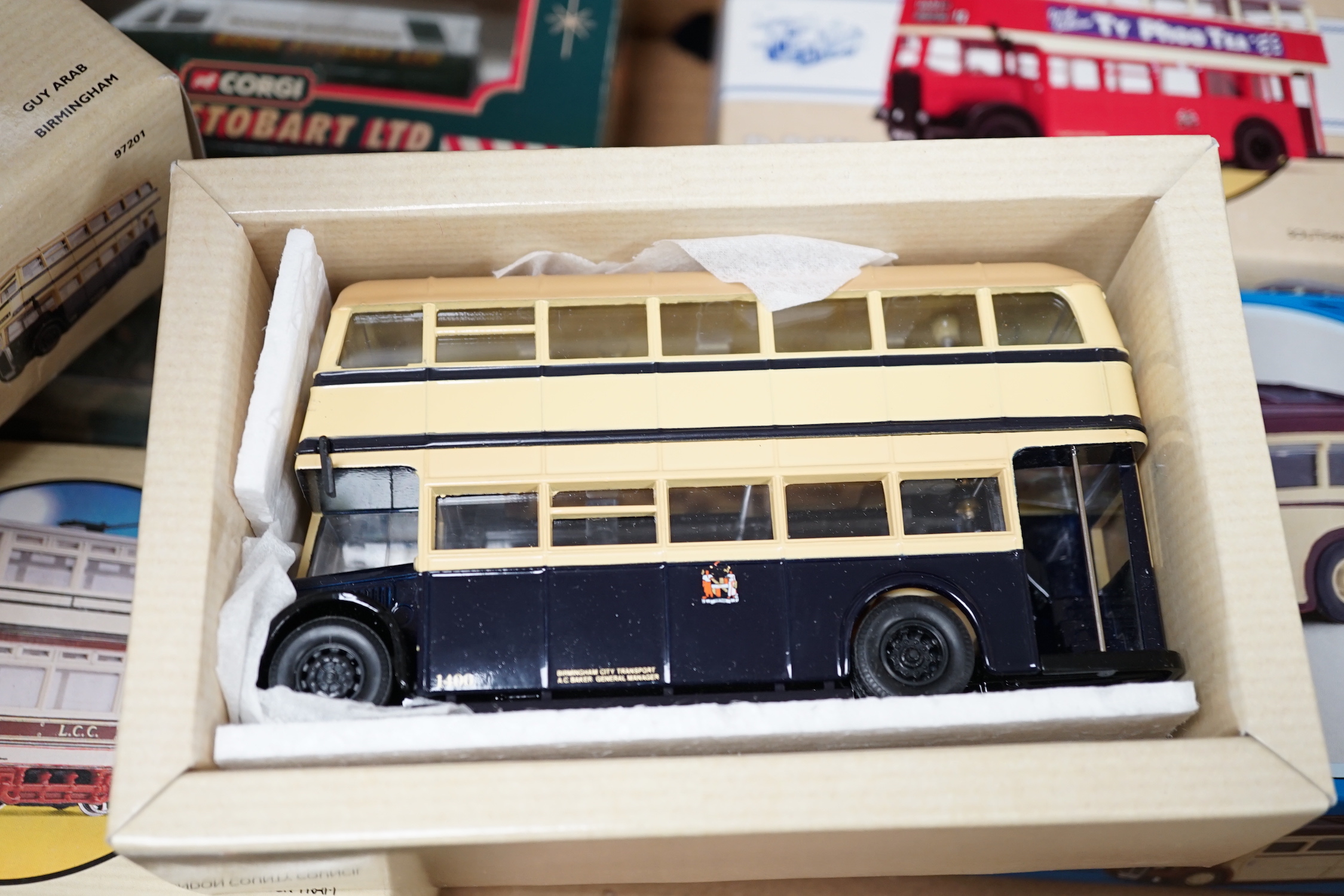 Eight boxed Corgi toys and two other die-cast models including; Eddie Stobart commercial vehicles, two Guy Arab buses, two double deck trams, etc.
